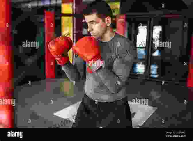 A Boxer Engaged In Intense Training On The Chin: A Boxing Education