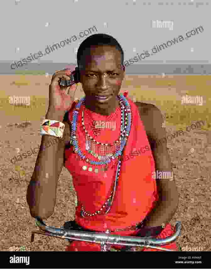 A Maasai Man Using A Mobile Phone, Illustrating The Influence Of Modernity On Maasai Culture. Children Of The Kraal: First In The