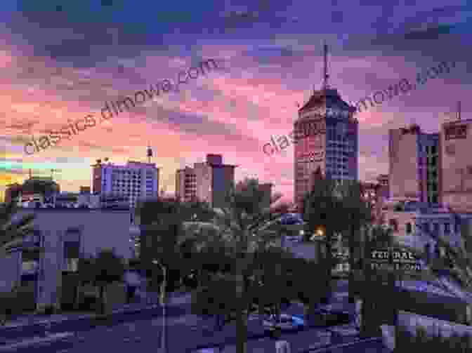 A Night Time Photograph Of Downtown Fresno With Lights Illuminating The City Skyline Freaky In Fresno Laurie Boyle Crompton