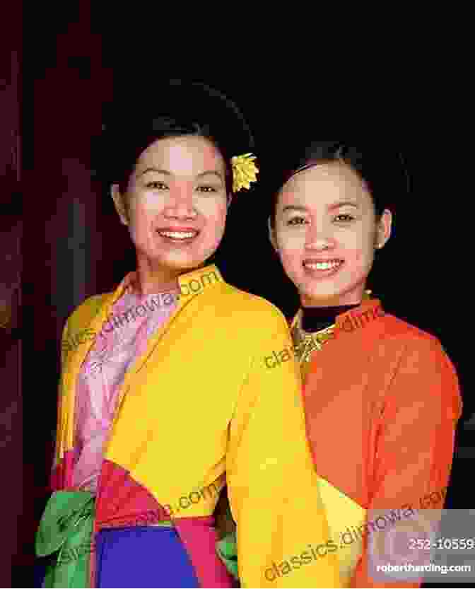 A Photo Of A Vietnamese Woman In Traditional Dress, Smiling And Welcoming Visitors To Vietnam VIETNAMESE TRAVEL GUIDE: Welcom To VietNam