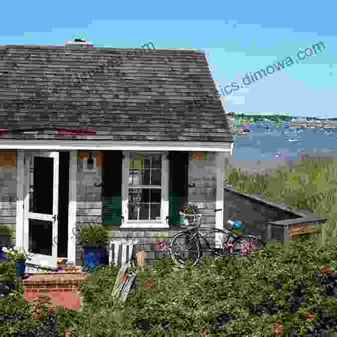 A Picturesque View Of Cape Eri, Featuring A Charming Seaside Cottage Nestled Amidst Lush Greenery. Cap N Eri Joseph Crosby Lincoln