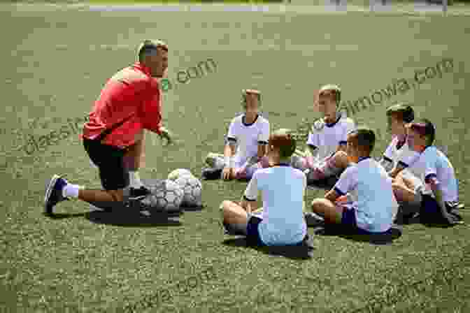 Coach Leading A Soccer Coaching Session With A Group Of Young Players. Create Your Own Soccer Coaching Session