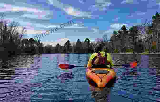 Kayaker Exploring A Tranquil Lake In Maine Maine Outdoor Adventure Guide Josh Christie