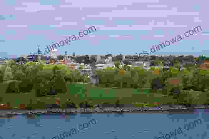 Panoramic View Of Belleville's Vibrant Waterfront, Showcasing The Towering Empire Theatre And The Glistening Waters Of The Bay Of Quinte Belleville Ontario 2 In Colour Photos: Saving Our History One Photo At A Time (Cruising Ontario 164)