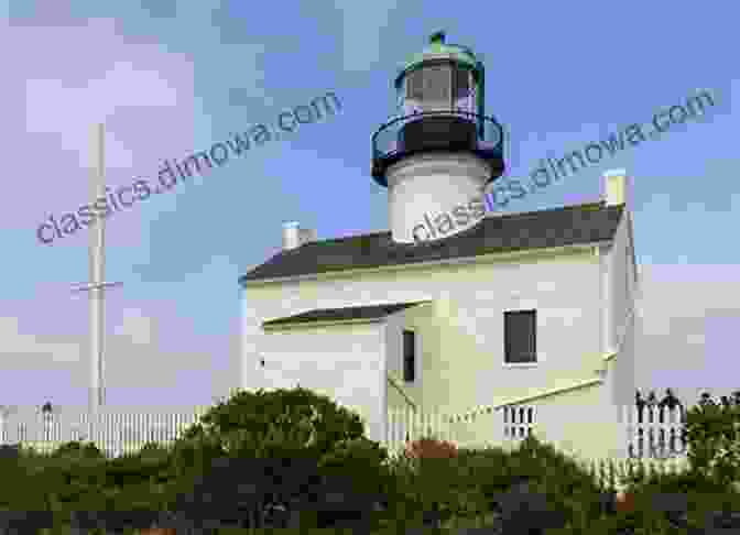 The Iconic Old Point Loma Lighthouse Standing Tall Against The Dramatic Sandstone Cliffs Of Cabrillo National Monument Once Around San Diego Bay