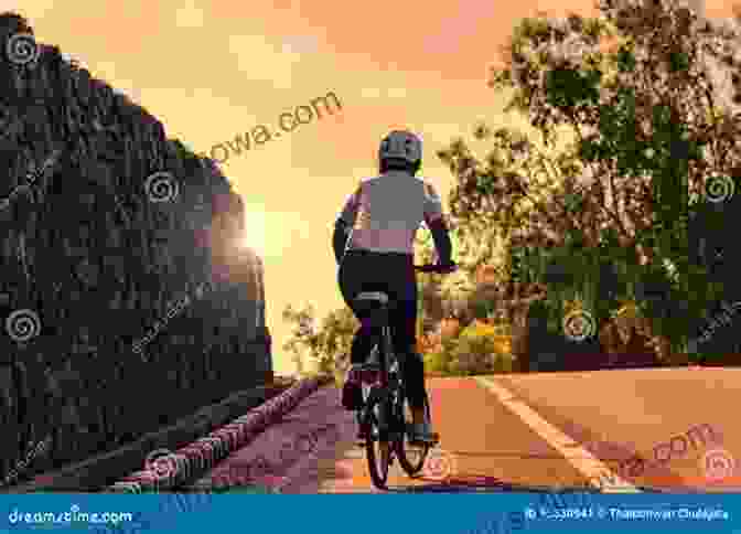 Woman Cycling Uphill On A Winding Road, Showcasing The Challenging Terrain And Her Unwavering Determination. Ride For Hope: One Woman S 3 527 Mile Solo Bicycle Ride That Inspired The Nation